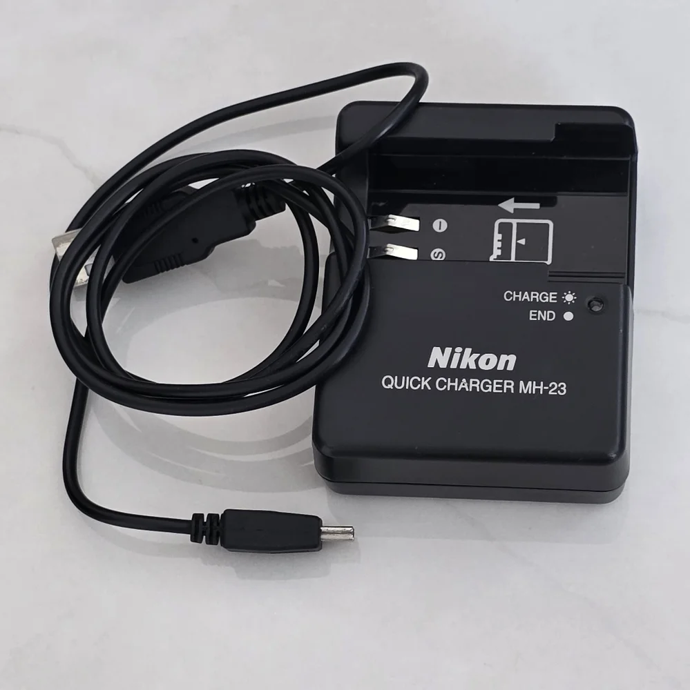 Nikon D40 Black Digital Camera with Two Lenses, Camera Bag And Charging Cord